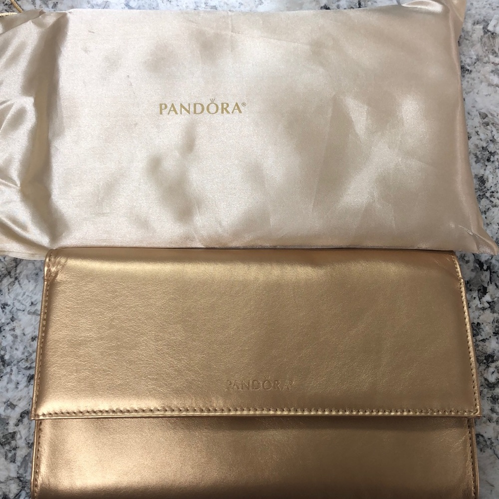 Pandora shine  gold clutch